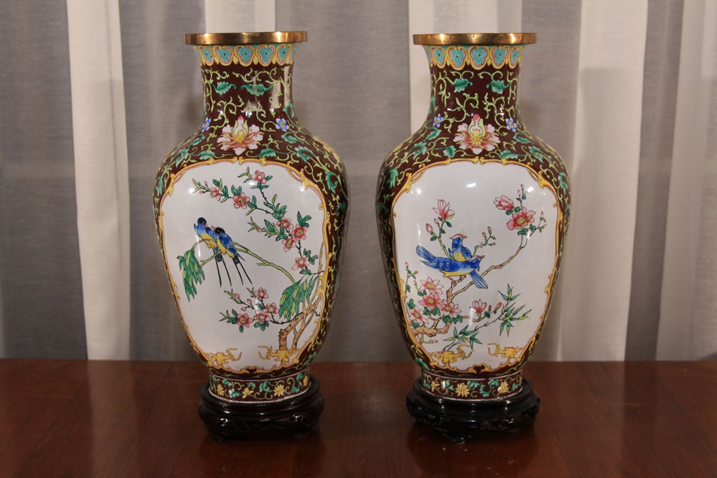 Chinese hand painted enameled metal vases.