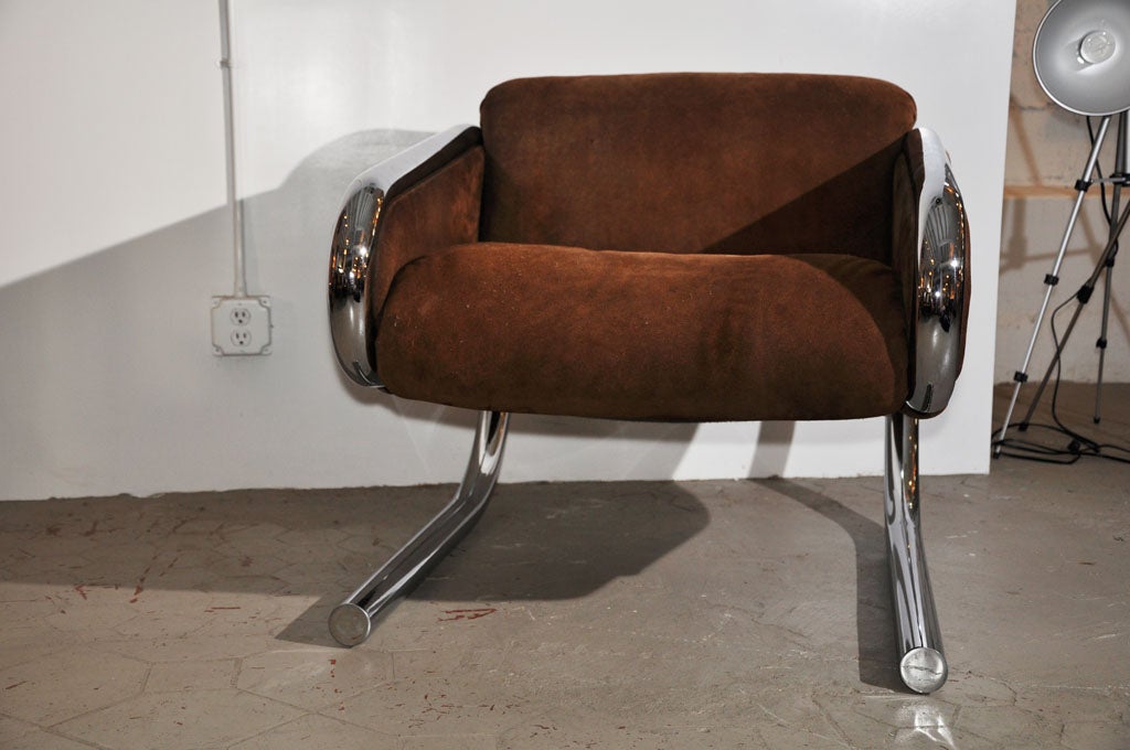 Harvey Probber cantilevered tubular chrome and suede lounge chairs. Paper label is attached to the underside of one chair and is printed 
