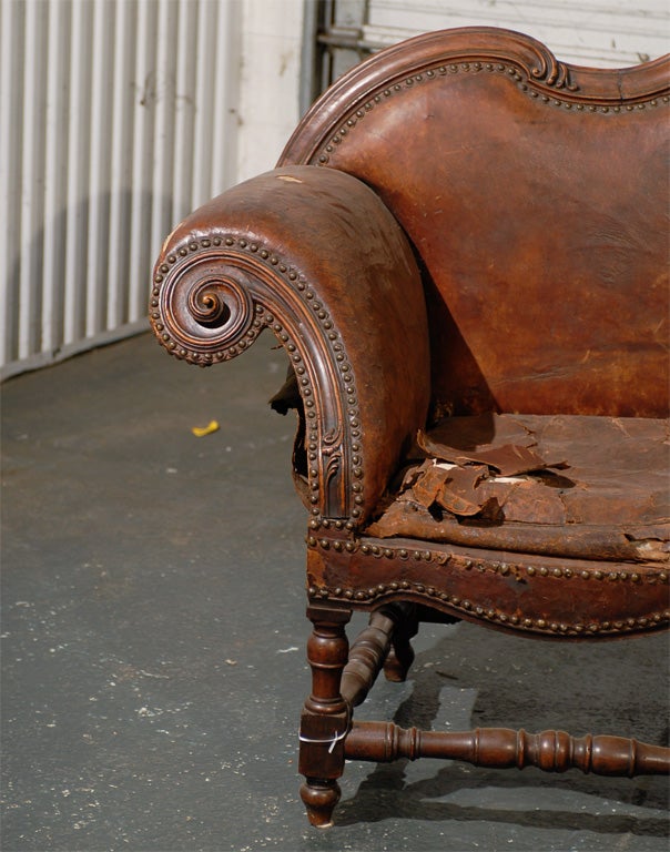 18th Century Spanish Colonial Settee, Old Leather.
In 1917 the Crane Cottage was built on Jekyll Island. This settee is rumored to be from that estate.