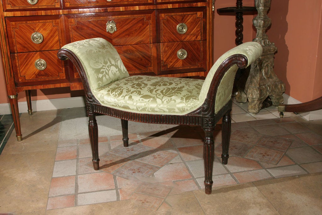 Fine George III (Hepplewhite) mahogany scroll arm window bench with bow serpentine front rail and fluting.