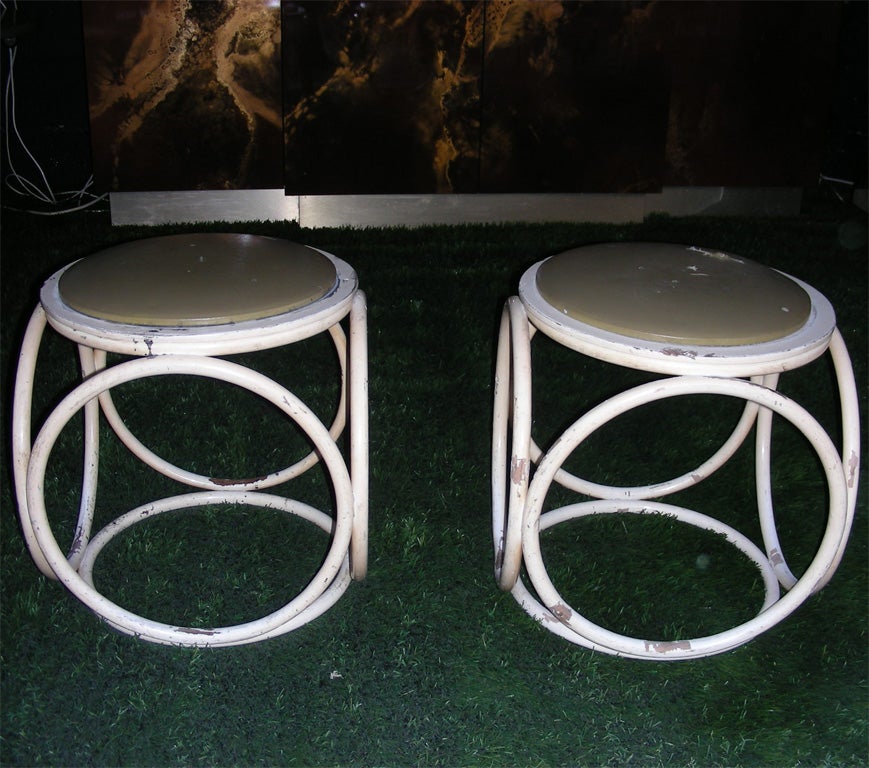 Two 1930s stools by Thonet with structure composed of circles.