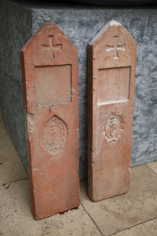 French terra cotta marker adorned with medaillons and cross