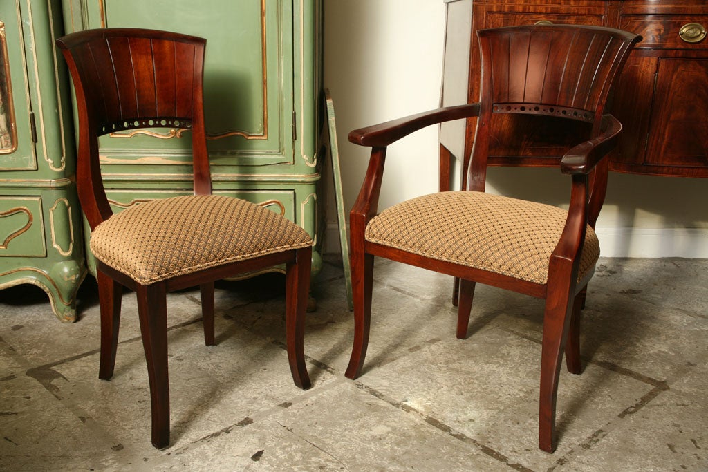 Ten 1920's french deco dining room chairs two arm & eight armchairs.