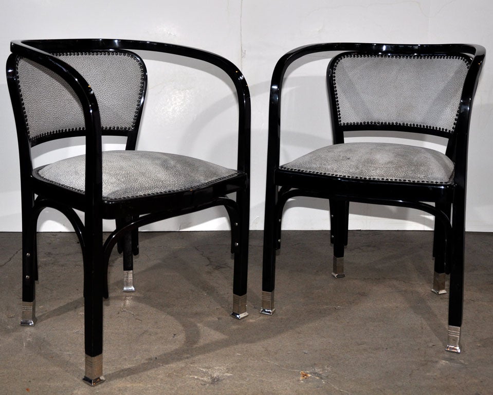 Set of 12 Vienna Secession ebony stained armchairs in beech wood with silver-plated brass feet by Gustav Siegel, produced by J. & J. Kohn, c. 1905.