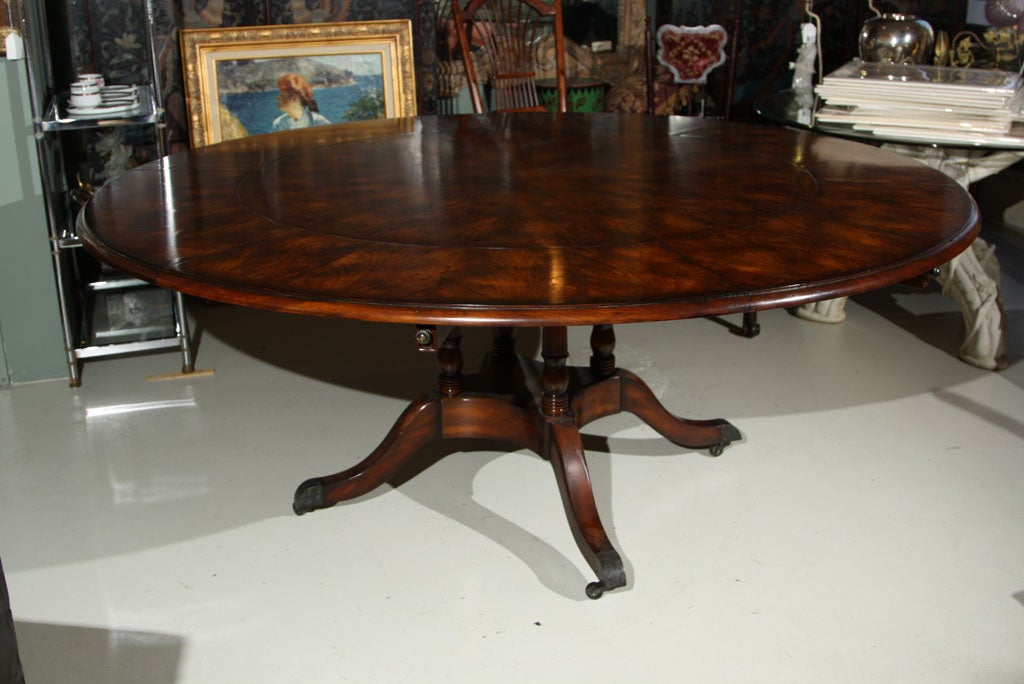 REGENCY PEDISTAL CURCULAR EXTENDING DINING TABLE - CROUCH MAHOGANY AND  WALNUT- FIVE  CRESCENT LEAVES- TABLE EXTENDS FROM 48