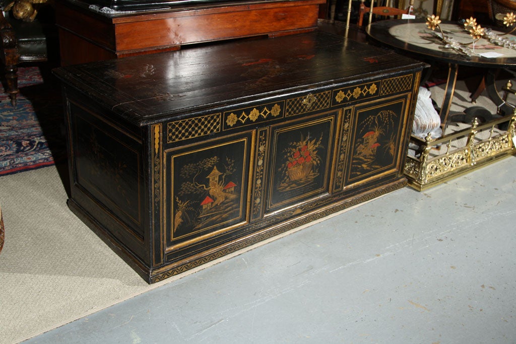 An English pine chest with painted chinoiserie decoration added in the mid 19th century.