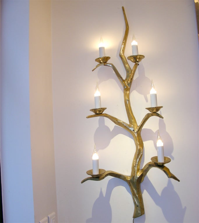 Exceptional pair of large 1950s sconces in gilt bronze by Felix Agostini with 6 lights.