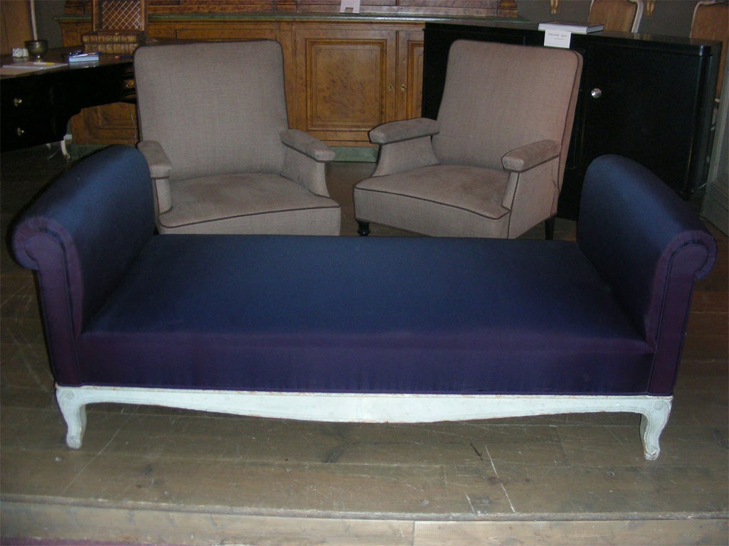 Handsome 1940s day bed, covered in high quality fabric.