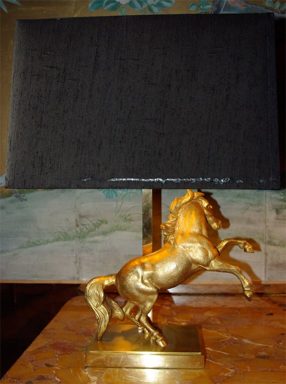 Two 1970s lamps with gilt bronze rearing horses.