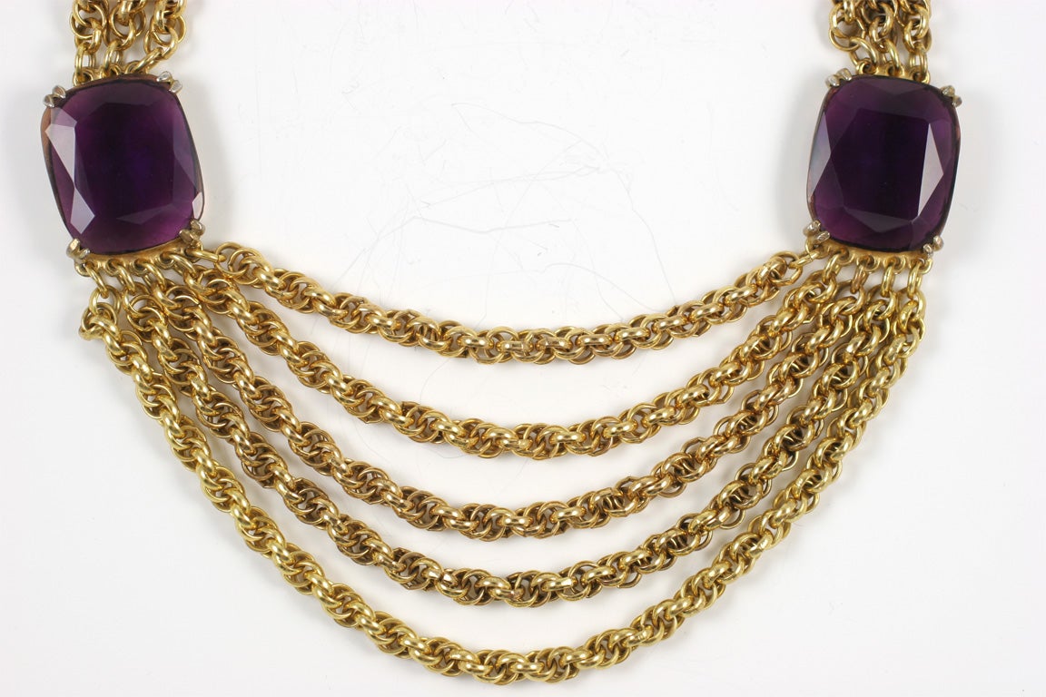 Multi strand gold chain necklace with two large faceted 