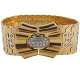 Elegant Gold and Diamond Ludo Bracelet with Bow