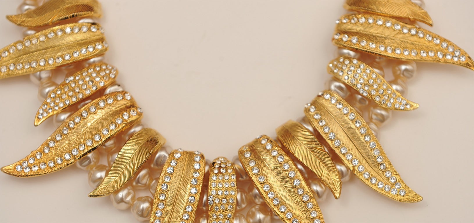 FAUX PEARL AND GOLD GILT NECKLACE WITH CLEAR RHINESTONES SET IN THE GILT METAL SIGNED MODELE DEPOSE PARIS  ON CIRCULAR CLOSURE AND CLAIRE DEVE ON BAR CLOSURE
