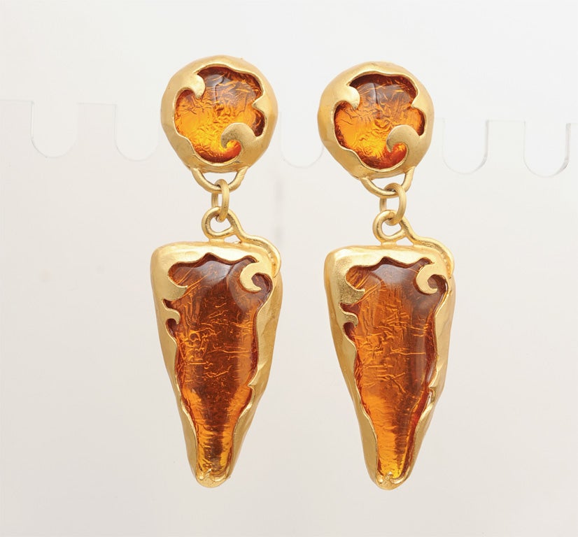 GOLD GILT AND POURED GLASS CHANDELIER  CLIP EARRINGS BY YVES ST LAURENT.THE EARRINGS ARE SIGNED YSL ON THE CLIPS