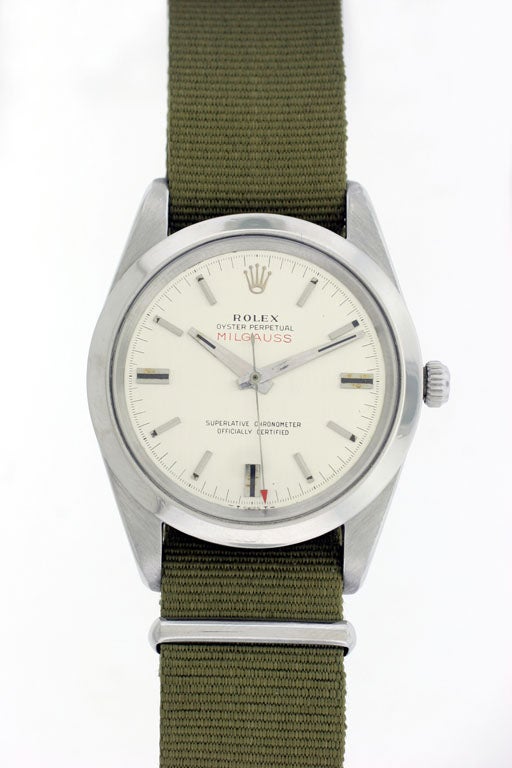 This is an early Rolex Oyster Milgauss, circa 1960's, in stainless steel with its oversize 37mm case, on a canvas strap.  This may be the ultimate anti-magnetic technology.  The Milgauss came out in 1953, originally designed as a tech watch for