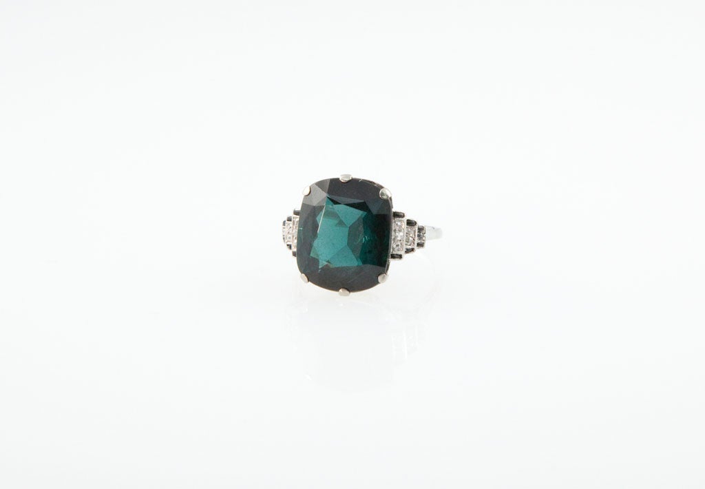 8.21 Carat cushion cut Blue Tourmaline set in a magnificant vintage Platinum setting