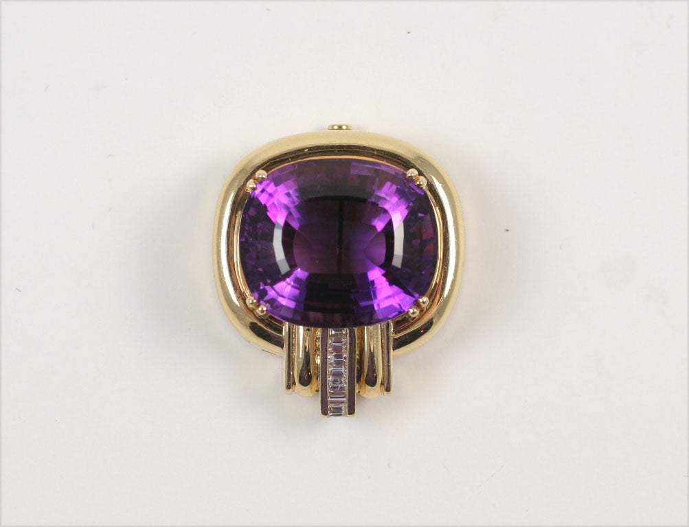 Bold deep Amethyst set in 14kt Yellow Gold with Diamond Baguette and round Diamonds. Can be worn as Pendant or Brooch.