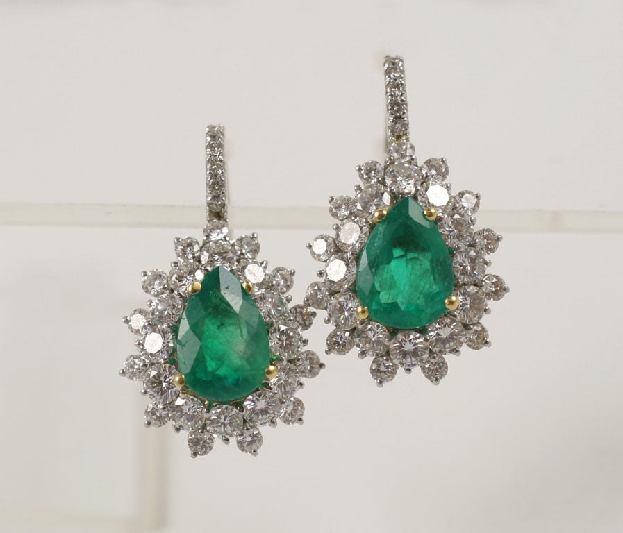 Exquisite Emerald and Diamond Earrings 5.23 Total weight in Diamonds
7.23 in Emeralds suspended by a diamond wire