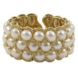 i  Wide  yellow gold and diamond bracelet