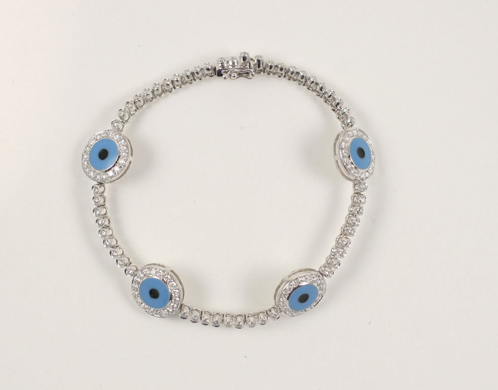 18 K Evil Eye Bracelet with 2.98 total weight in diamonds <br />
promises to ward the evils of life away
