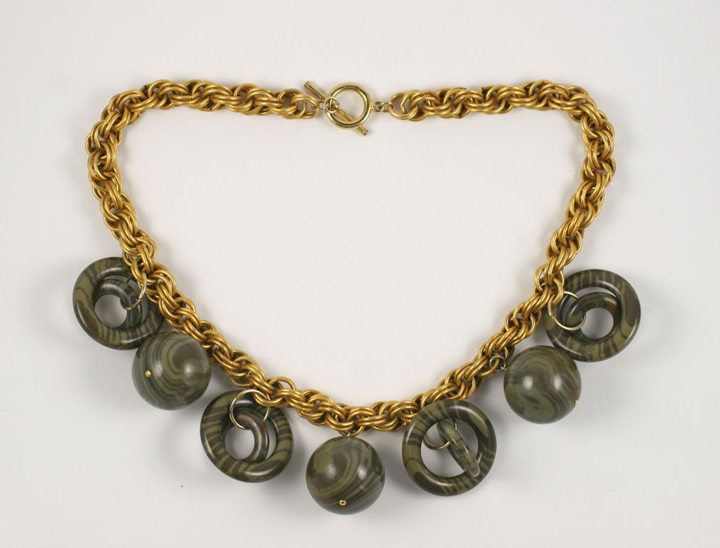 Large chunky goldtone chain with multiple grey tiger striped baubles. Balls are 1