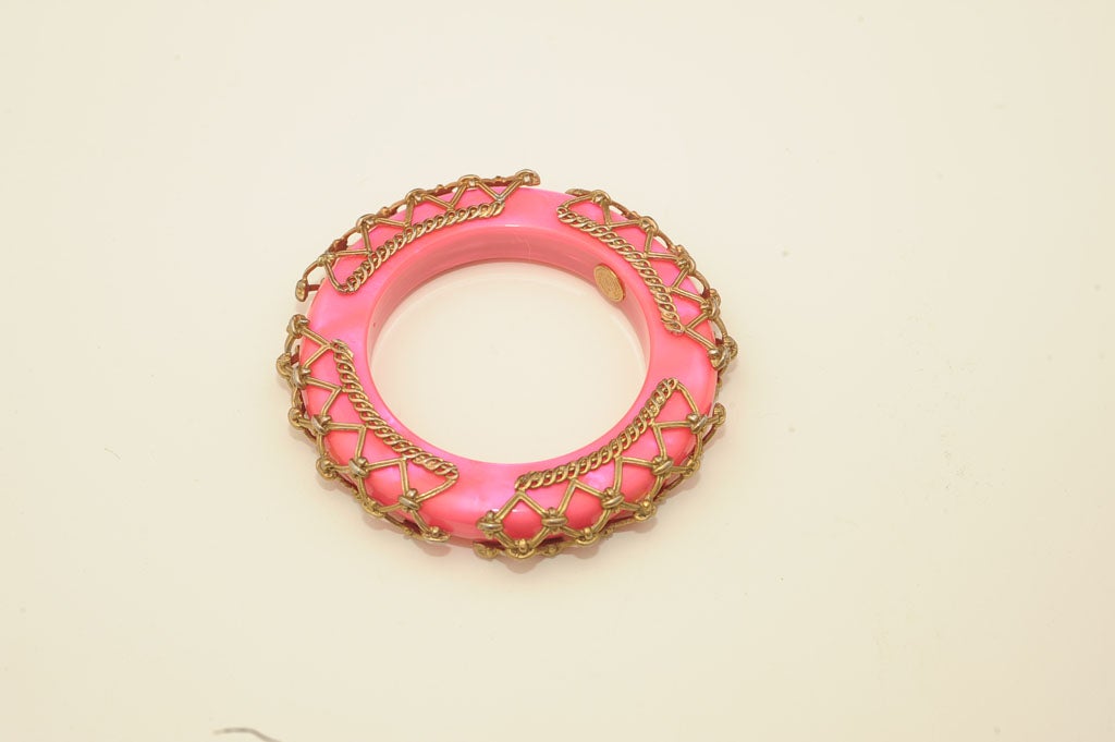 DOMINIQUE AURIENTIS SIGNED PINK LUCITE AND MESH BANGLE 1