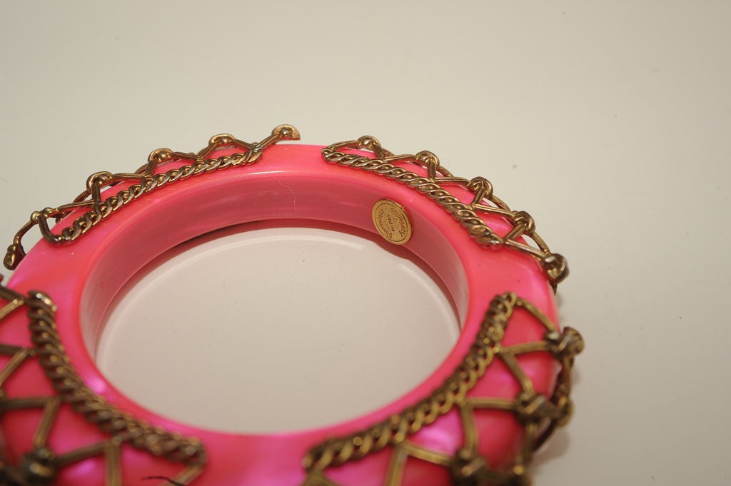 DOMINIQUE AURIENTIS SIGNED PINK LUCITE AND MESH BANGLE 2