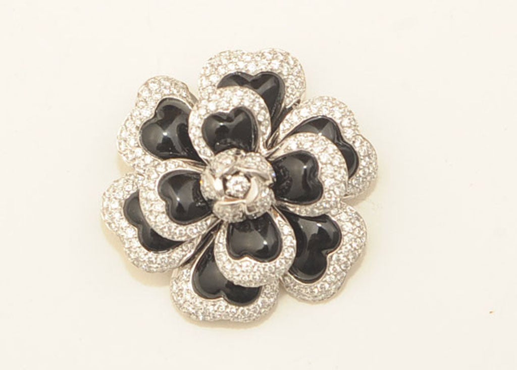 CLASSIC CHANEL CAMELLIA BROOCH SET WITH DIAMONDS AND BLACK ENAMEL