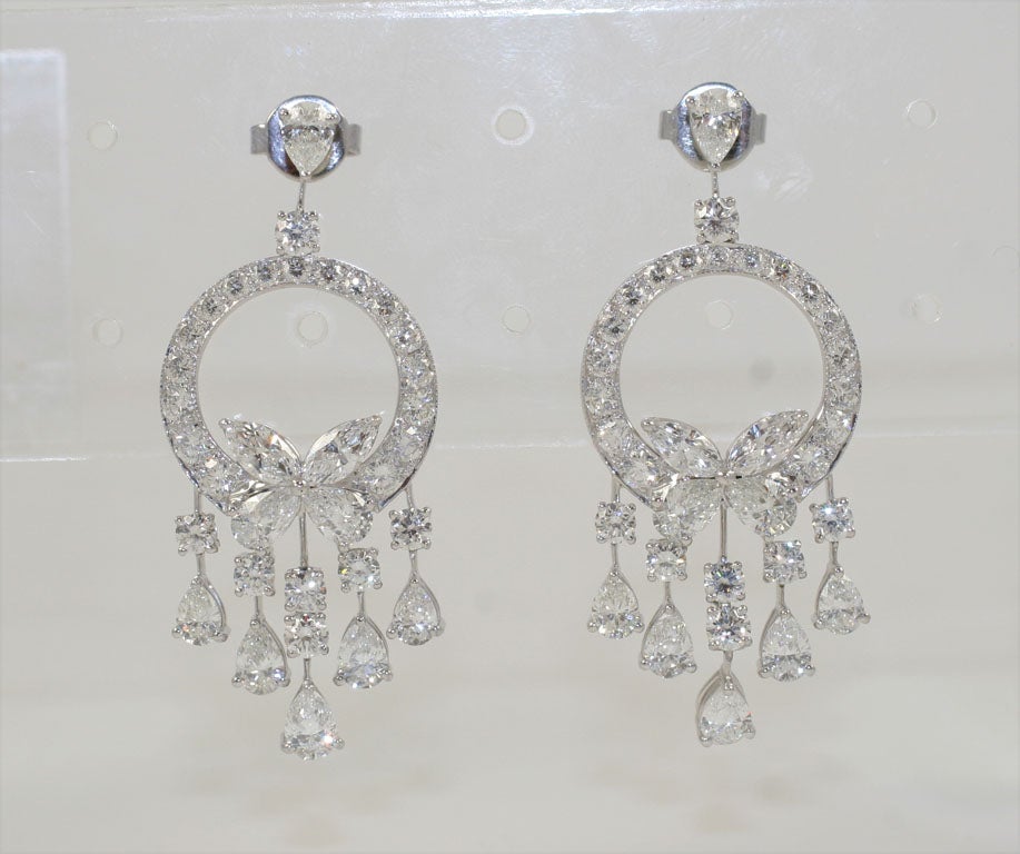 18 k White Gold Diamond Earrings with Fancy cut Pear shapes,  marquise and brilliant round shaped diamonds totaling 13.80 f-g color