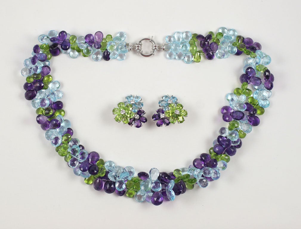 18kt White Gold Three Flower earring with Amethyst, Peridot and Blue Topaz; and matching Two Strand Faceted Briolette Necklace with Amethyst, Peridot, and Blue Topaz and 18kt White Gold Clasp