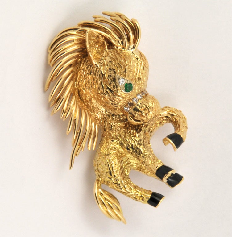Van Cleef & Arpels pony-shaped yellow gold brooch