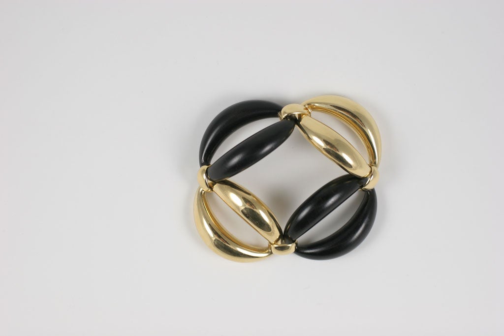 bracelet en or jaune 18kt et ébène à maillons ovales avec joints et fermoir en or