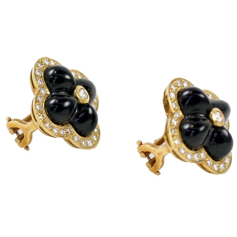 18k yellow gold black onyx and diamond flower earrings For Sale
