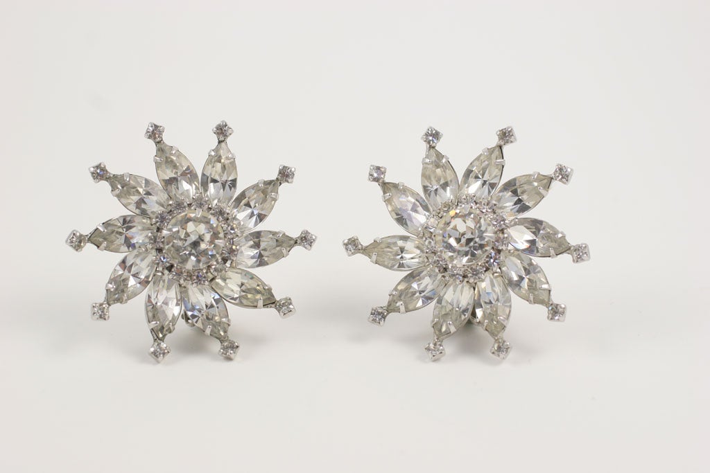 Huge sparkly star shaped rhinestone earrings.