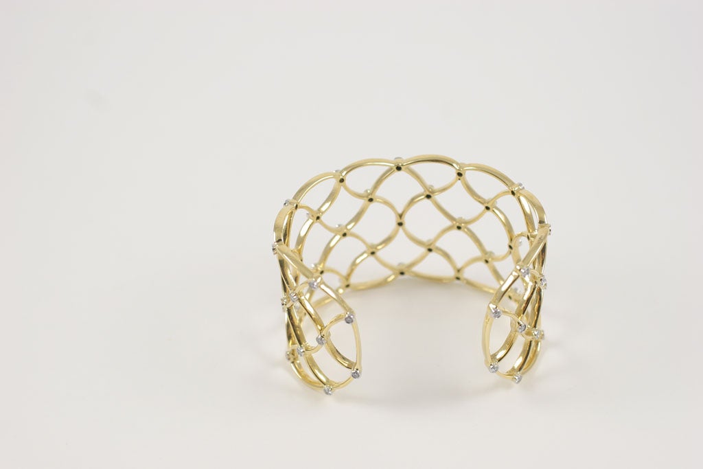 Contemporary Gold Woven Cuff with Diamonds For Sale