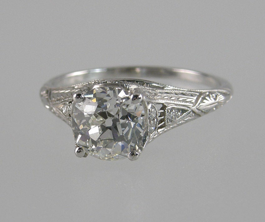 Beautiful Art Deco Platinum diamond engagement ring. The center diamonds is an Old European Cut 1.48 carats, I color and VS2 clartiy (EGL certificate).  <br />
It is a gorgeous original ring.