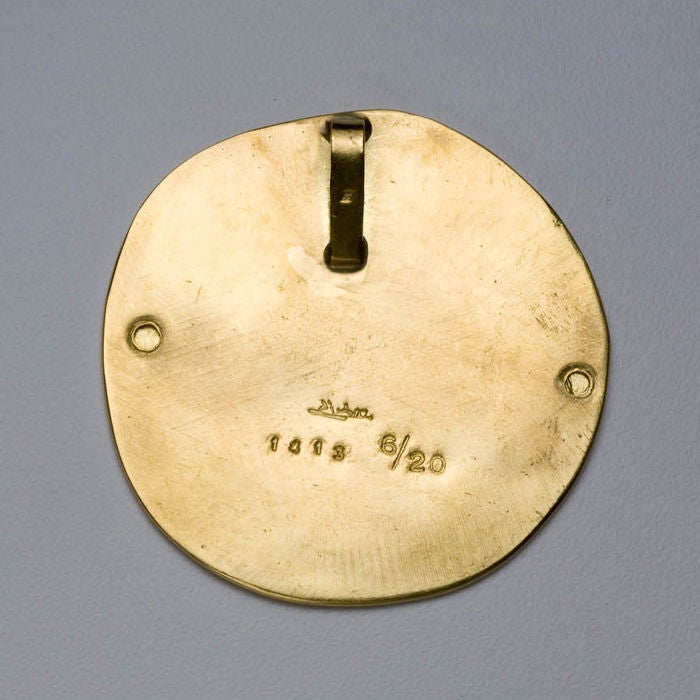 A pendant in a bull motif by Picasso in 22 karat gold. Signed on the back with Picasso's signature, French makers mark, 