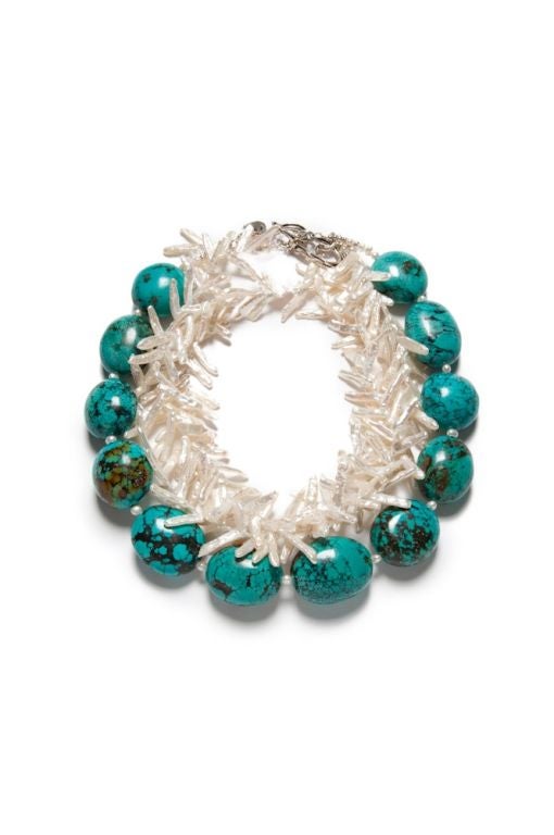 Turquoise necklace with white fresh water pearls and silver. Two strands can be worn separately or together.   (turquoise = 22 inches in length)  (Fresh water pearls = 20 inches in length)