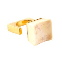 STERLE. A yellow gold and ivory ring.