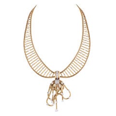 BOUCHERON PARIS. A gold and diamond necklace.