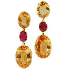 SYMBOLIC & CHASE. A Pair of Imperial Topaz and Burmese Ruby Drop