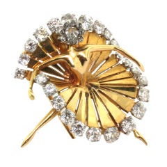 VAN CLEEF & ARPELS. A gold and diamond ‘Ballerina’ brooch.