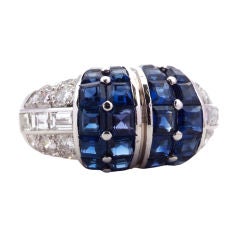 CARTIER. A sapphire and diamond ring.
