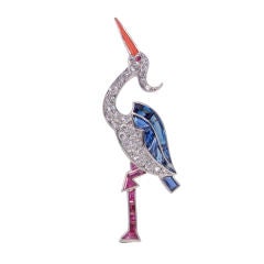 A French, gem-set and diamond brooch in the form of a heron.