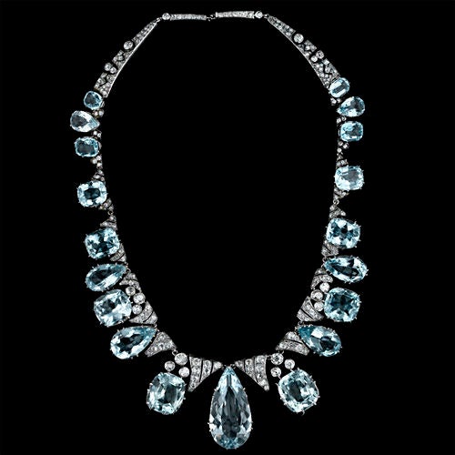 A rare and gorgeous, opulent and elegant, Victorian era Aquamarine and diamond necklace in silver over gold. A graduated array of pear shape and cushion shape aquamarines totaling approximately 150(!) carats are presented in regal style , circa