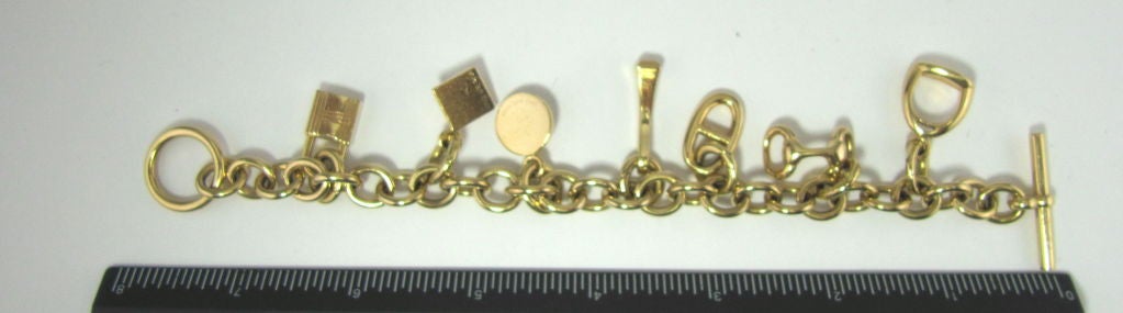 HERMES 18K Gold 7-armiges Gliederarmband mit Knebelverschluss 1