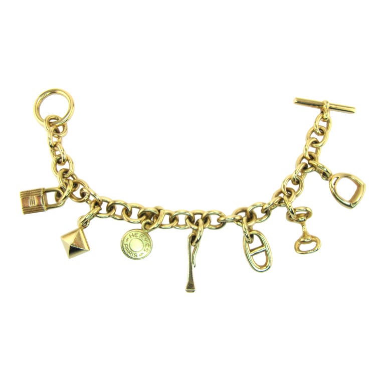 Yellow Gold Charm Bracelet at 1stDibs  antique charm bracelet gold,  vintage gold charm bracelet