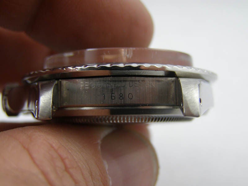 Rolex SS RED Submariner Date ref# 1680 circa 1972 B & P 4