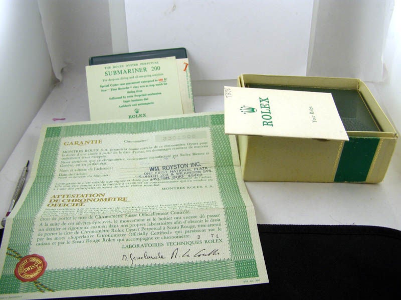Rolex SS RED Submariner Date ref# 1680 circa 1972 B & P 5