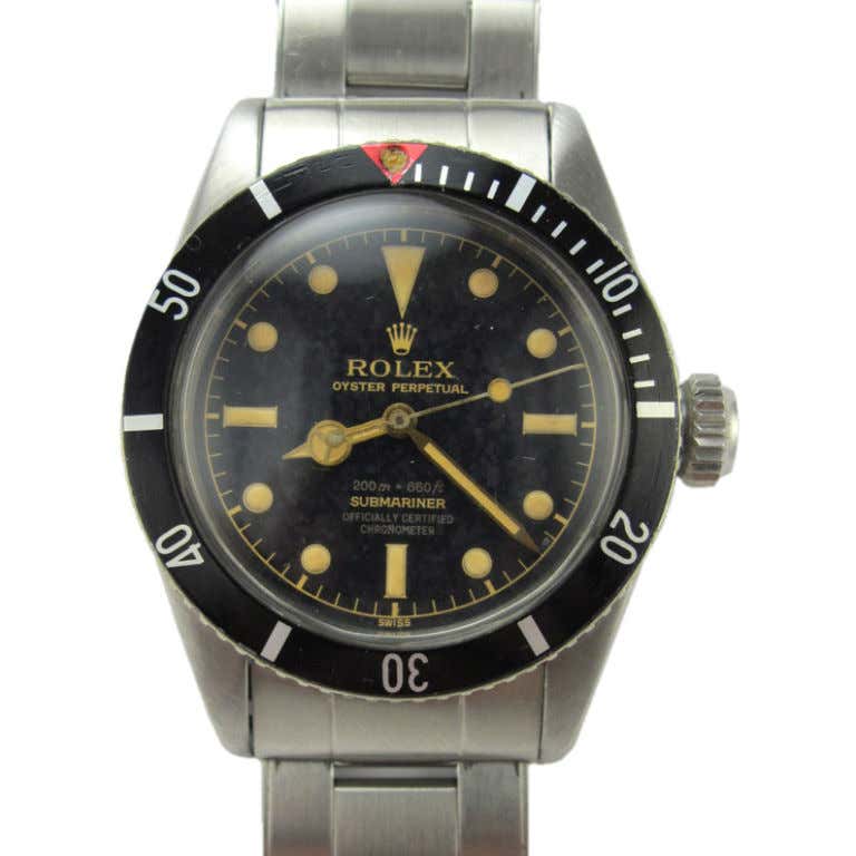 Rolex Triangle Rolex Submariner Red Triangle - For Sale on 1stDibs
