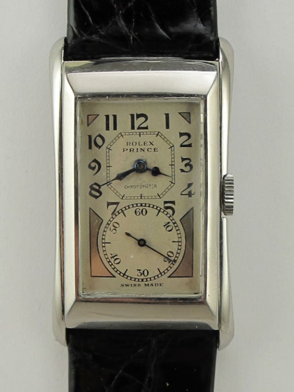Rolex SS Prince Brancard flared case model ref 1490 circa 1930's with beautiful original 2 tone silver satin dial with black figures and blued steel spade hands. Rolex calibre 300 17 jewel chronometer rated movement adjusted 7 positions with